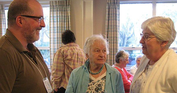 Father Larry Rice, CSP (left) , national director of the Paulist Associates, greets Molly Sutkaitis, an associate from St. Peter's Church in Toronto (center) and Grand Rapids associte Cathy Hoekstra at the Paulist Associates Retreat.