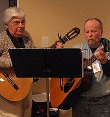 Cathy Hoekstra from Grand Rapids, Michael Jones from Florida and Becca Schott from Columbus lead the music during the liturgy at the Paulist Associates Retreat.