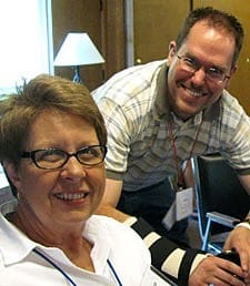 Paulist seminarian Rich Andre catches up with Chicago Paulist Associates Maryann Cushing (left) and Dorothy O'Malley.