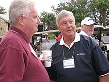 Paulist president Father John F. Duffy (left) and Paulist Open chairman Bob Schweizer talk before the shotgun start of the Paulist Ope