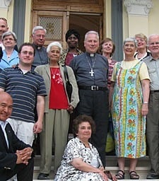 Archbishop Michael L. Fitzgerald, papal nuncio to Egypt (center), hosted the Paulist pilgrims at his home for Mass, refreshments and camaraderie. 