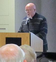 Father Paul Huesing, CSP, welcomes guests to the 2012 Hecker Lecture, delivered by Mary Jo Bane Jan. 3 at St. Paul's College in Washington, D.C. Mrs. Bane is a professor at Harvard's Kennedy School of Government and an involved parishioner at the Paulist Center in Boston.