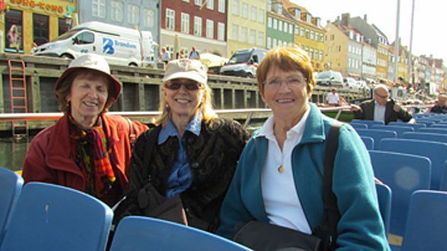 Lucy Delgado from Hoboken, NJ (left), Hildi Keary from Boston, Mass, and Mary Tansey from Berkeley, Calif., experience Copenhagen, Denmark, through a canal cruise at teh beginning of the 2012 Paulist Pilgrimage.