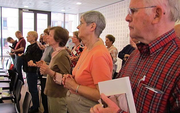Pilgrims attend Mass