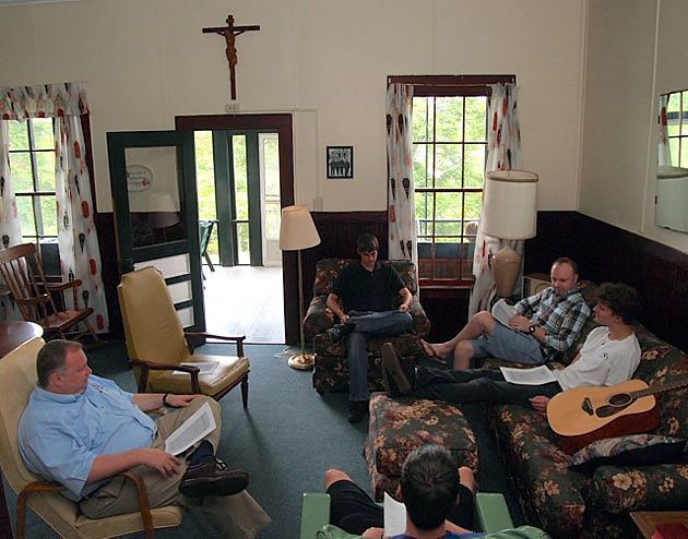 Paulist Vocations Director Father Dave Farnum, CSP, (far left) leads a session with the five men on the Paulist Plunge at St. Mary's on Lake, Lake George, N.Y.