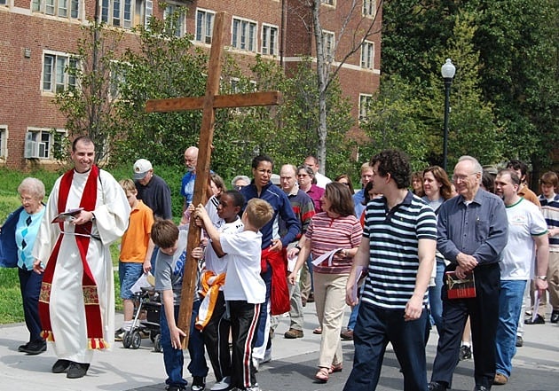 Father Eric Andrews, C.S.P., leads the Good Friday Procession at John XXIII Univeristy Parish in Knoxville.