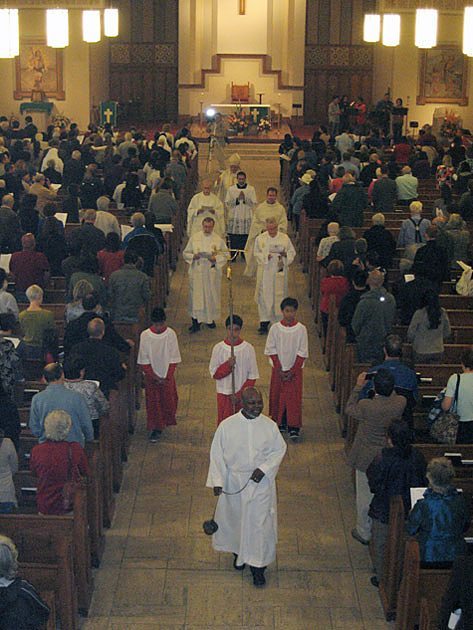 The recessional procession Sept. 15 at St. Peter's Church in Toronto, where Cardinal Thomas C. Collins of Toronto presided over the Mass celebrating 100 years of the Paulists in Canada.