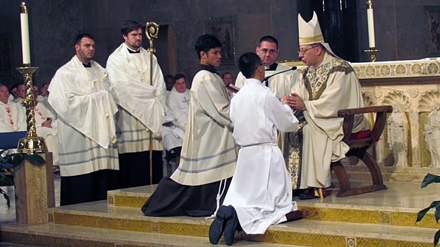Jimmy Hsu, CSP, promises obedience to the bishop whereever he may serve during ordination Mass to the dianconate with Bishop Barry C. Knestout presiding.