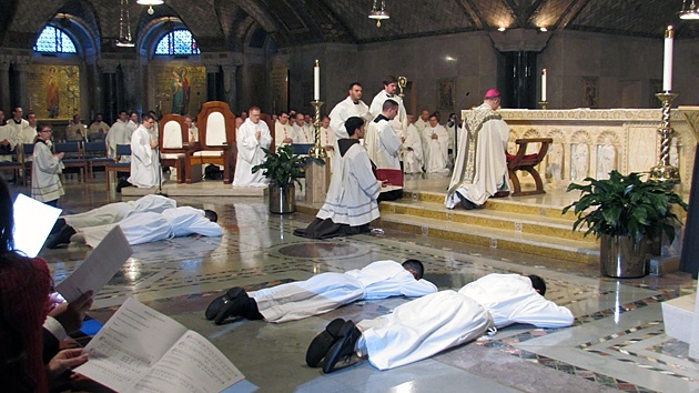 The ordinandi lay prostrate during the Litany of Saints. Paulist Jimmy Hsu is second from the right.