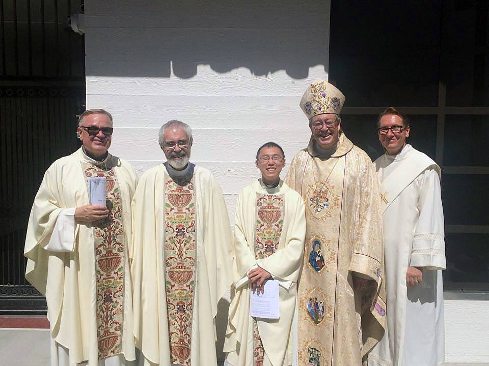 Father John Ardis, CSP, pastor of St. Paul the Apostle Church (left); associate pastor Father Joe Scott, CSP; associate pastor Father Jimmy Hsu; Bishop Edward Clark of Los Angeles; and Deacon Danny Amos gather for a photo op after the blessing of the new buildings at St. Paul the Apostle School in Los Angeles.