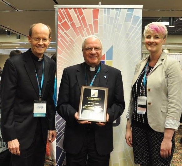Paulist Fr. Ken Boyack, Paulist Fr. Frank DeSiano and Margaret Matijasevic, NCCL executive director.